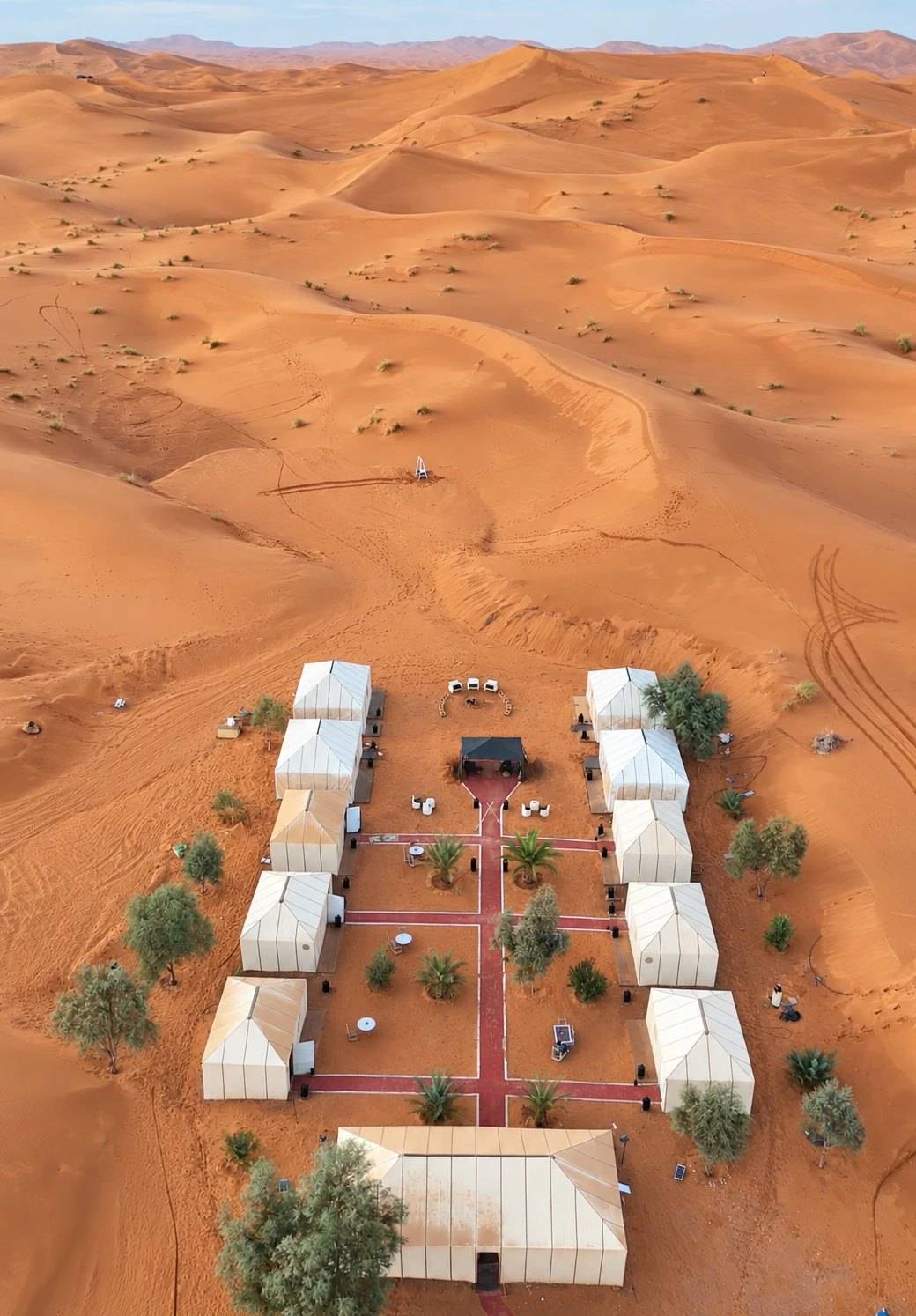Aerial view of Camel Trips Luxury Camp: 10 private tents among the dunes of Erg Chebbi, Merzouga