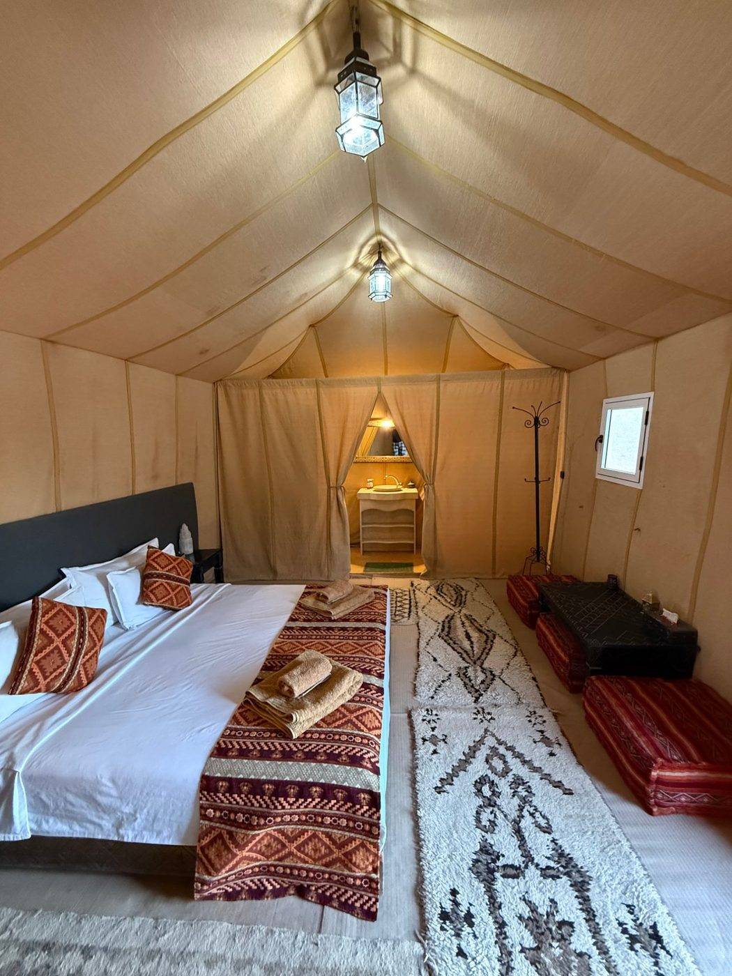 Inside a luxury tent at Camel Trips Luxury Camp
